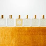 The PARFUM SATORI collection arranged on gold fabric, symbolising harmony, clarity and design.